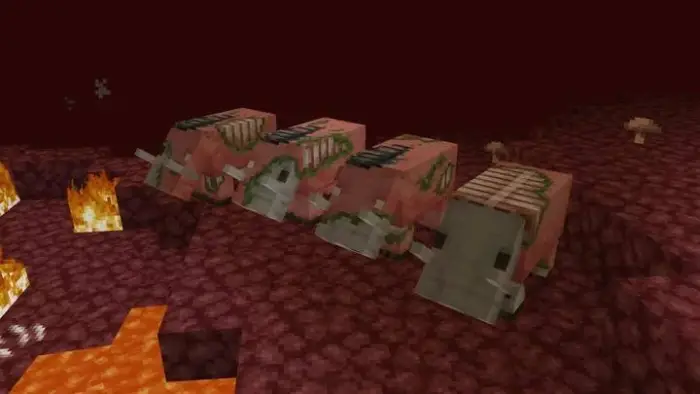 Four zombified hoglins in a fiery cave