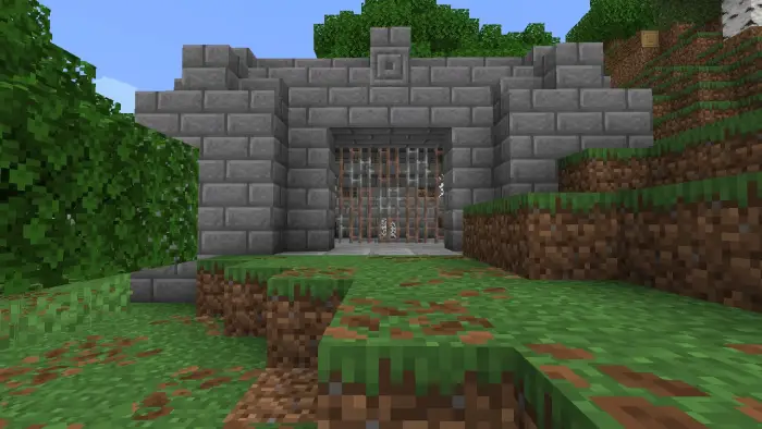 Stone dungeon entrance with iron bars