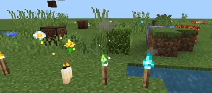 Colorful particles around torches and candles