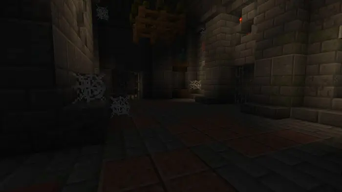 Dark stone dungeon with cobwebs and torches