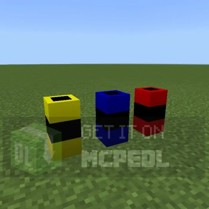 Three colorful fireworks launchers on grass.