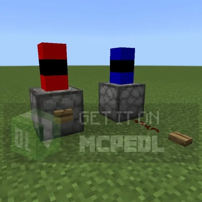 Red and blue fireworks launchers on grass.