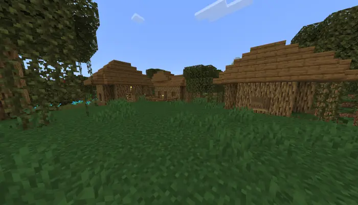 Wooden village houses in a lush swamp biome