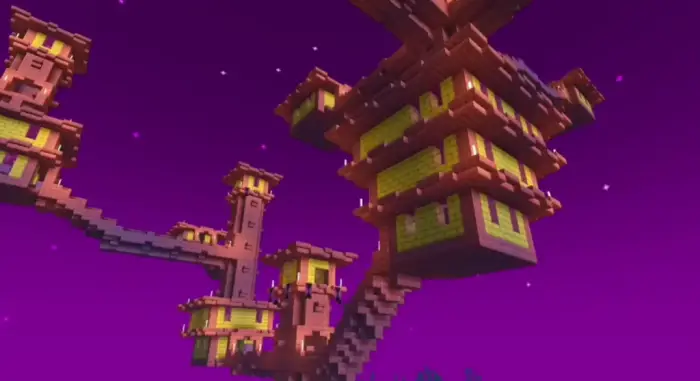 Vibrant blocky towers under purple sky