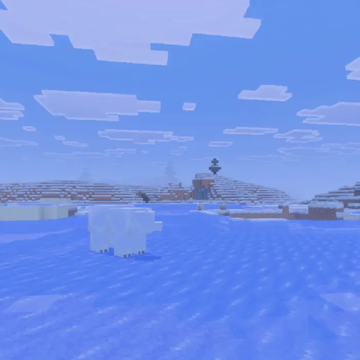 Snowy landscape with ice and a polar bear