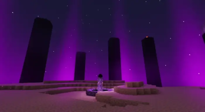 Purple-lit pillars and glowing portal at night