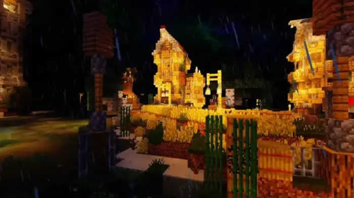 Glowing village scene with rain at night
