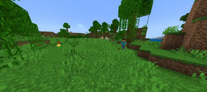 Mysterious figure stands in grassy forest.