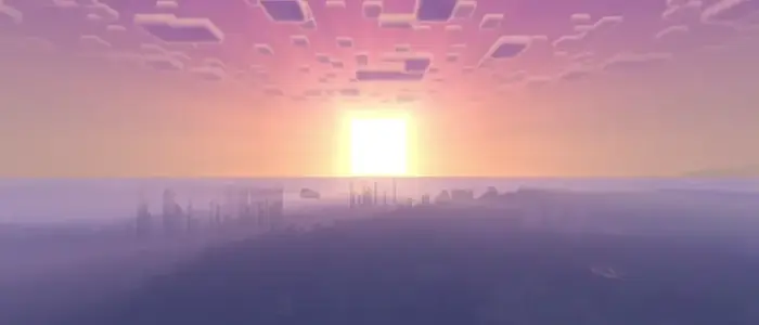 Vivid sunrise over water with soft clouds