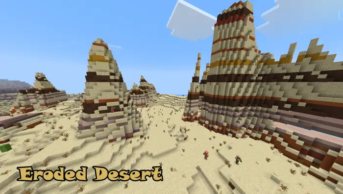 Striped sandstone towers in a dry desert