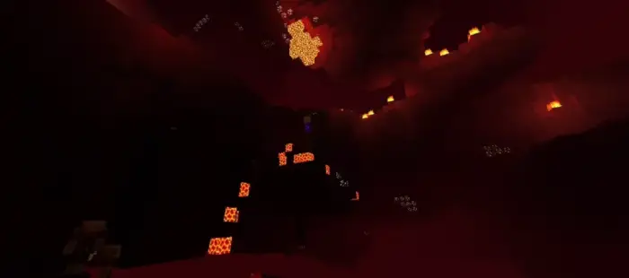 Glowing lava and shadows in a dark cavern