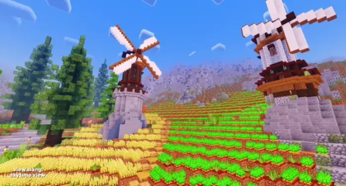 Vivid windmills and fields under bright sky