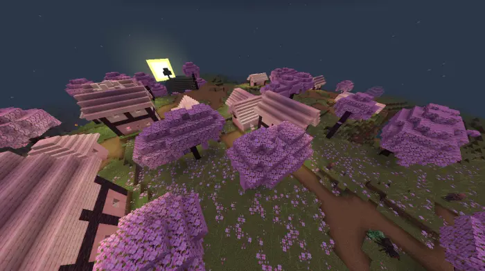 Cherry Grove village with pink trees at sunset