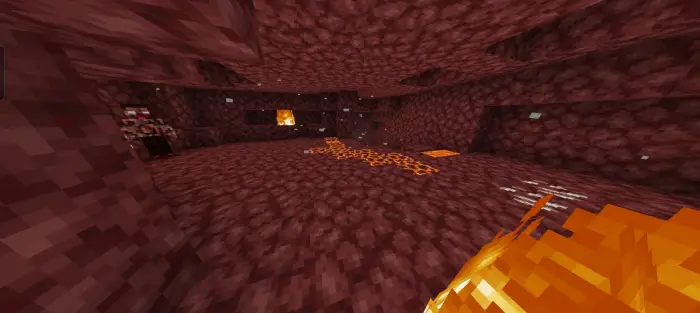 Dark nether cave with fire and lava flows