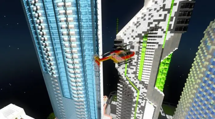 Red helicopter flying between city skyscrapers