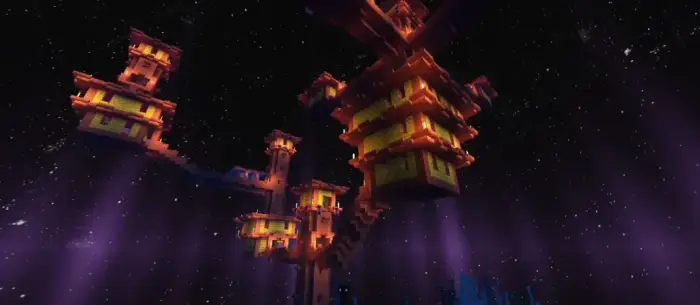 Vibrant blocky towers under a starry sky