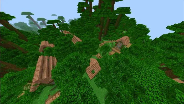 Jungle village buildings nestled in dense trees