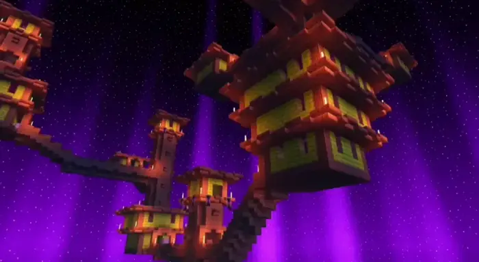 Colorful blocky towers with glowing purple sky