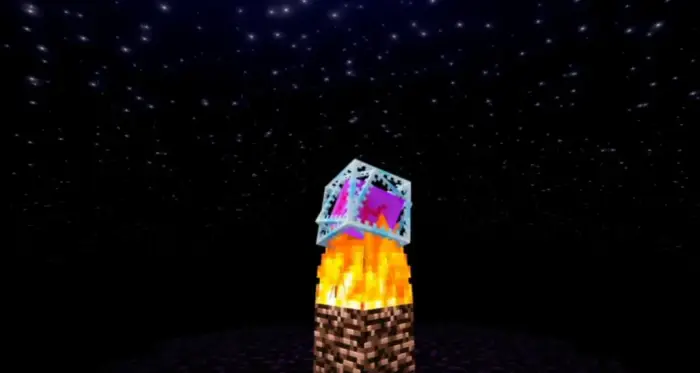 Pixelated fire under a glowing starry sky