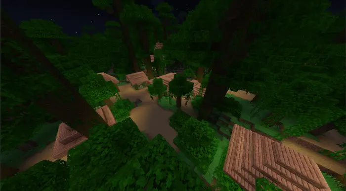 Jungle village houses among dense trees at night