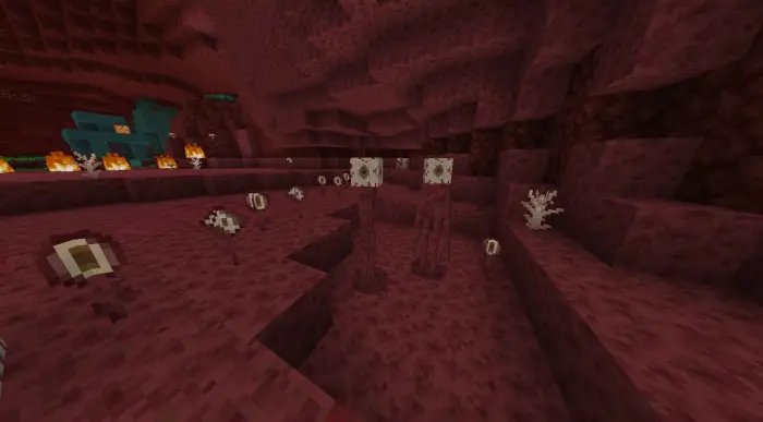 Strange plants in a crimson Nether cavern