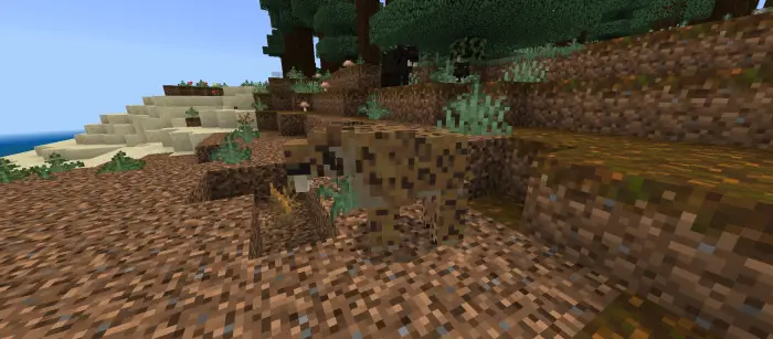 Blocky prehistoric dire wolf on dirt terrain
