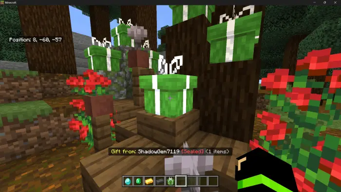 Green wrapped gifts on wooden steps outdoors