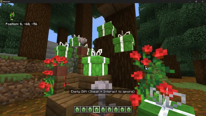 Green gift boxes stacked in a forest scene