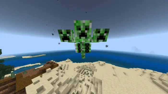 Three-headed creeper monster flying above sand