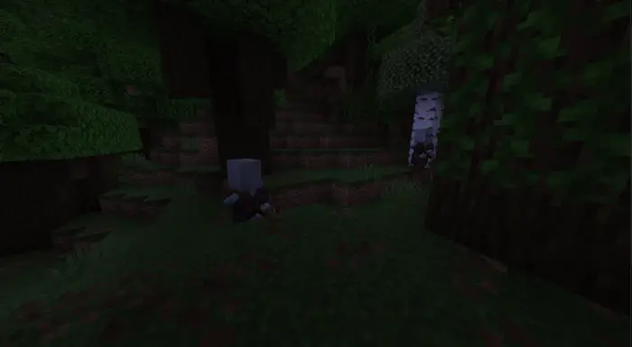 Illagers roaming in a dark forest biome