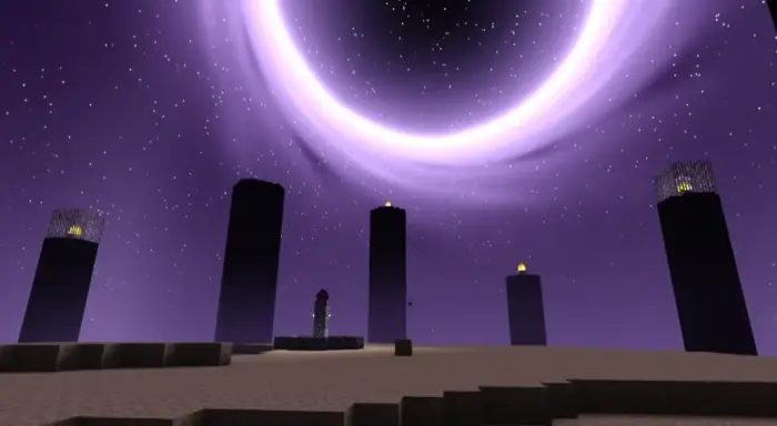 Glowing pillars under a vivid purple sky