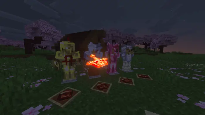 Four fantasy armor sets on display at dusk