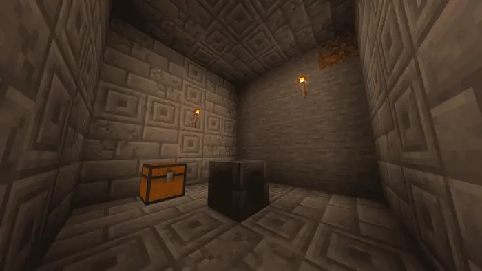 Stone dungeon room with chest and anvil