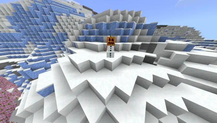 Snow golem stands on snowy mountain slope
