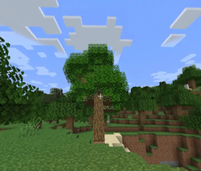 Blocky tree and clouds in a pixel landscape