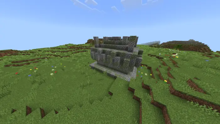 Ruined stone structure on grassy plains