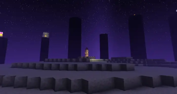 Glowing stars and tall pillars at night