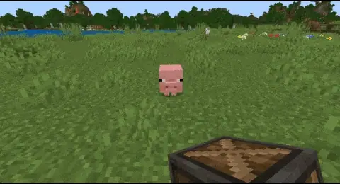 Piglet approaches player holding a tool.