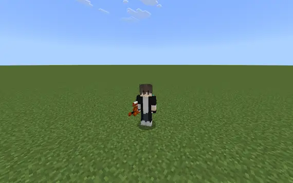 Player holding a silly sound item on grass