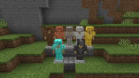 Six armor sets displayed on stands outdoors.