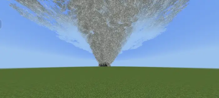 Large tornado forming over grassy plain