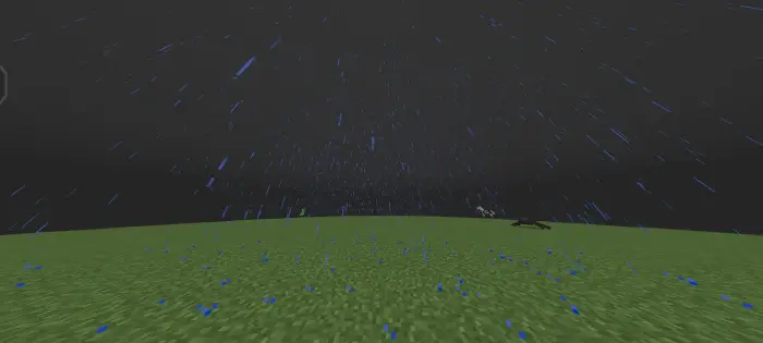 Heavy rain falling on grassy terrain