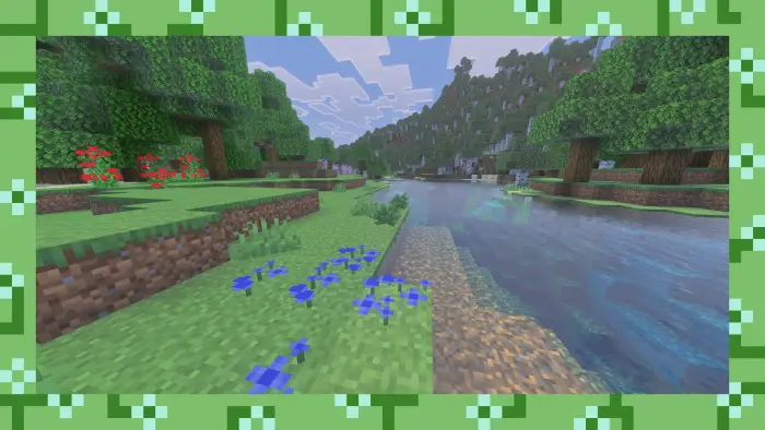 Riverbank with vibrant flowers and trees