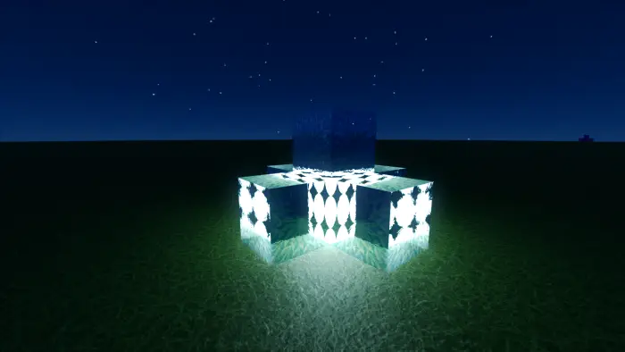 Glowing textured blocks on grass at night