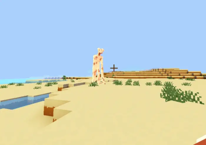 Tall, pale monster stands on sandy terrain.