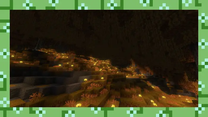 Glowing plants illuminate an underground biome.