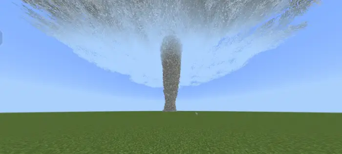 Large tornado forming over grassy plain