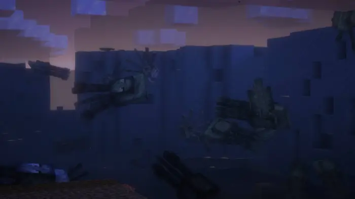 Multiple squid variants swimming underwater