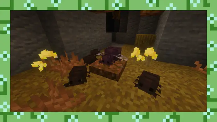 Small brown cave creatures among yellow plants