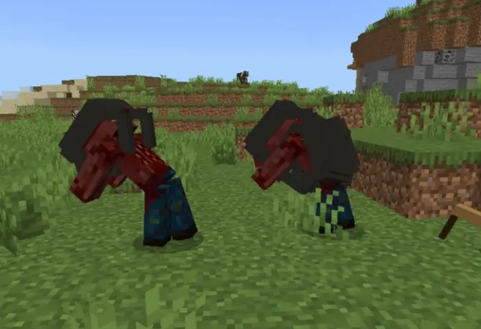 Two headcrab-infected zombies on grass